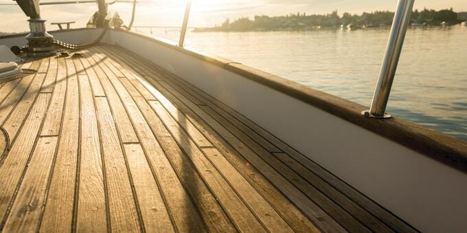 a wooden dock on a body of water