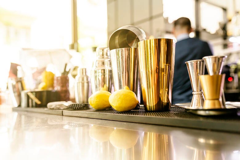 a counter with a few lemons on it