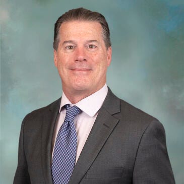 a man in a suit and tie