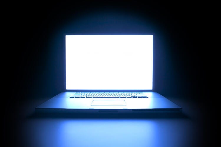 a laptop with a blank screen