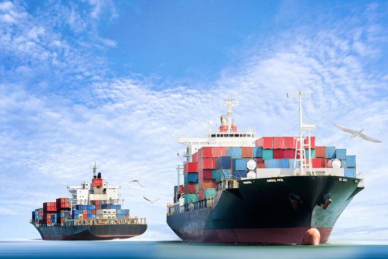 a couple of large ships in the water